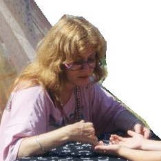 Patti reading hands